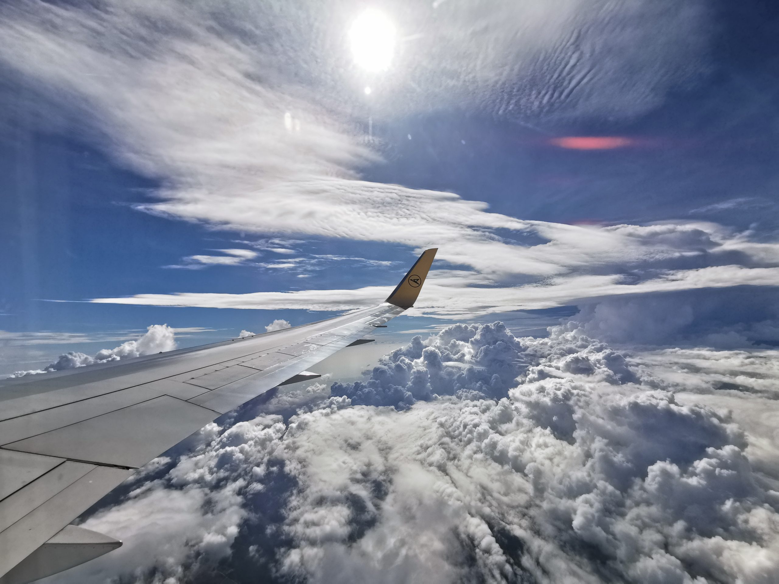 Flugzeug Wolken Sonne